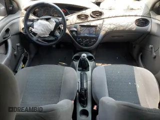 2001 Ford Focus ZX3 z VIN 3FAFP31331R219011, wystawiony jako Copart lot #56032315 z przebiegiem 365 925 mil mil oraz Szkoda całkowita • Salvage title. Historia ofert i sprzedaży dostępna na DreamBid. Obrazek 8.
