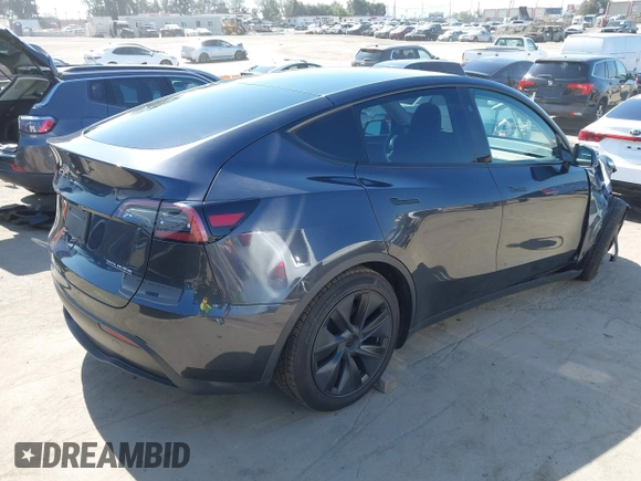2024 Tesla Model Y z VIN 7SAYGDED4RF115252, wystawiony jako IAAI lot #42302658 z przebiegiem 7 365 mil mil oraz . Historia ofert i sprzedaży dostępna na DreamBid. Obrazek 4.