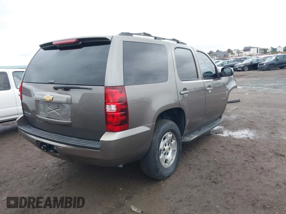2013 Chevrolet Tahoe LS with VIN 1GNSCAE06DR105066, listed as a IAAI auction lot 41586288 with 161,639 mi miles and . Bid and sale history available at DreamBid. Image 4.