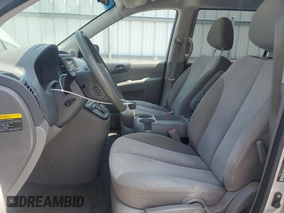 2012 Kia Sedona LX with VIN KNDMG4C79C6471109, listed as a Copart auction lot 68013564 with 229,316 mi miles and Salvage Title. Bid and sale history available at carsss.com. Image 7.