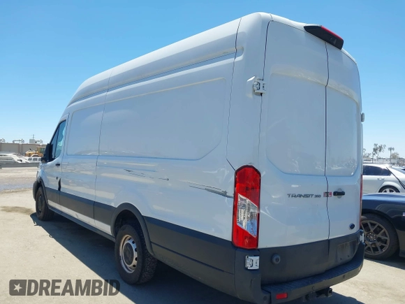 2020 Ford Transit Cargo z VIN 1FTBW3X89LKB72069, wystawiony jako IAAI lot #42623407 z przebiegiem 454 279 mil mil oraz . Historia ofert i sprzedaży dostępna na DreamBid. Obrazek 3.