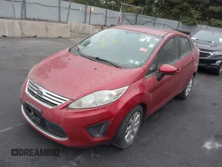 2012 Ford Fiesta SE with VIN 3FADP4BJ1CM145114, listed as a IAAI auction lot 40446295 with 169,529 mi miles. Bid and sale history available at carsss.com. Image 2.