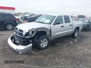 2007 Dodge Dakota SLT with VIN 1D7HE48KX7S122712, listed as a IAAI auction lot 41888864 with 114,384 mi miles and . Bid and sale history available at carsss.com. Image 2.
