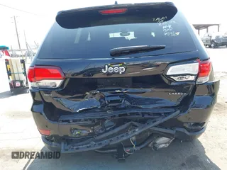 2022 Jeep Grand Cherokee Laredo X with VIN 1C4RJEAG7NC171377, listed as a IAAI auction lot 42592264 with 69,074 mi miles and . Bid and sale history available at DreamBid. Image 6.