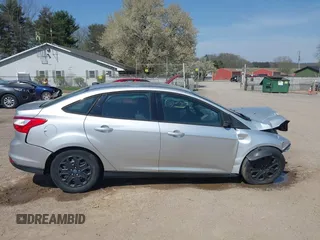 2012 Ford Focus SE with VIN 1FAHP3F2XCL217086, listed as a IAAI auction lot 42072717 with 112,549 mi miles. Bid and sale history available at carsss.com. Image 14.