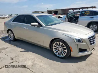 2014 Cadillac CTS Luxury AWD with VIN 1G6AX5SX2E0141251, listed as a Copart auction lot 62943445 with 85,614 mi miles and Salvage title. Bid and sale history available at DreamBid. Image 4.