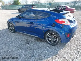 2016 Hyundai Veloster Turbo with VIN KMHTC6AE4GU260112, listed as a IAAI auction lot 41868273 with 130,853 mi miles. Bid and sale history available at carsss.com. Image 3.