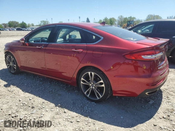 2019 Ford Fusion Titanium with VIN 3FA6P0D91KR205463, listed as a Copart auction lot 54764795 with 105,719 mi miles and Salvage title. Bid and sale history available at DreamBid. Image 2.