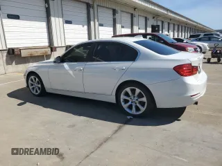 2015 BMW 3 Series 320i xDrive with VIN WBA3C3C56FK202154, listed as a Copart auction lot 54655145 with 71,205 mi miles and Salvage title. Bid and sale history available at DreamBid. Image 2.