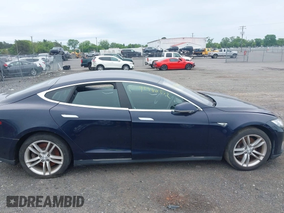 2014 Tesla Model S 60 with VIN 5YJSA1H19EFP32063, listed as a IAAI auction lot 42360872 with 103,495 mi miles and . Bid and sale history available at DreamBid. Image 13.