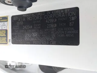 2013 Kia Optima LX with VIN KNAGM4A76D5379047, listed as a IAAI auction lot 41973373 with 135,454 mi miles. Bid and sale history available at carsss.com. Image 9.