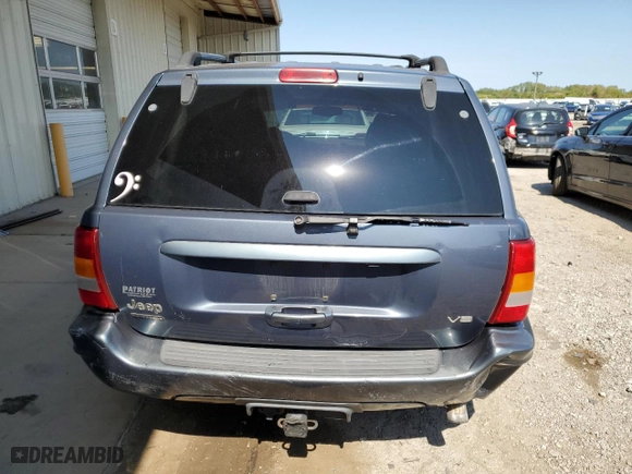 2003 Jeep Grand Cherokee Limited with VIN 1J8GW58N73C605929, listed as a Copart auction lot 70755024 with 173,147 mi miles and Salvage Title. Bid and sale history available at carsss.com. Image 6.