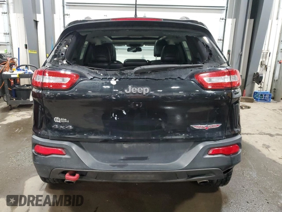 2014 Jeep Cherokee Trailhawk with VIN 1C4PJMBS5EW294212, listed as a Copart auction lot 88816885 with 151,779 mi miles and Salvage title. Bid and sale history available at DreamBid. Image 6.