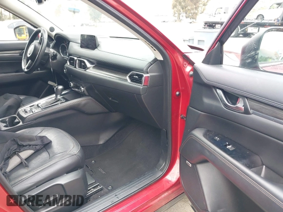 2018 Mazda CX-5 Grand Touring with VIN JM3KFADMXJ0302656, listed as a IAAI auction lot 42099173 with 125,378 mi miles and . Bid and sale history available at DreamBid. Image 5.
