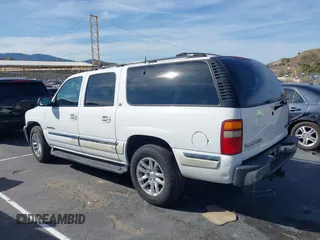 2001 GMC Yukon XL SLE with VIN 3GKFK16TX1G276201, listed as a IAAI auction lot 41537220 with 150,495 mi miles. Bid and sale history available at carsss.com. Image 3.