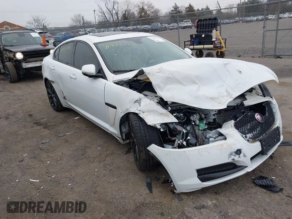 2014 Jaguar XF SC with VIN SAJWA0EX0E8U09381, listed as a IAAI auction lot 41783386 with 27,730 mi miles and . Bid and sale history available at DreamBid. Image 1.