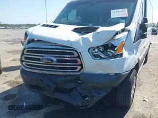 2017 Ford Transit with VIN 1FTYE2CM6HKB32372, listed as a IAAI auction lot 42247909 with 197,640 mi miles and . Bid and sale history available at DreamBid. Image 6.