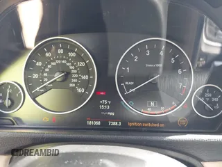 2014 BMW 4 Series 428i xDrive with VIN WBA3N9C58EF721369, listed as a IAAI auction lot 41768891 with 181,068 mi miles and . Bid and sale history available at DreamBid. Image 7.