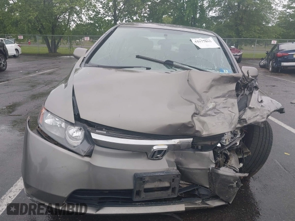 2008 Honda Civic LX z VIN 2HGFA16598H312083, wystawiony jako IAAI lot #42377035 z przebiegiem 156 711 mil mil oraz . Historia ofert i sprzedaży dostępna na DreamBid. Obrazek 12.