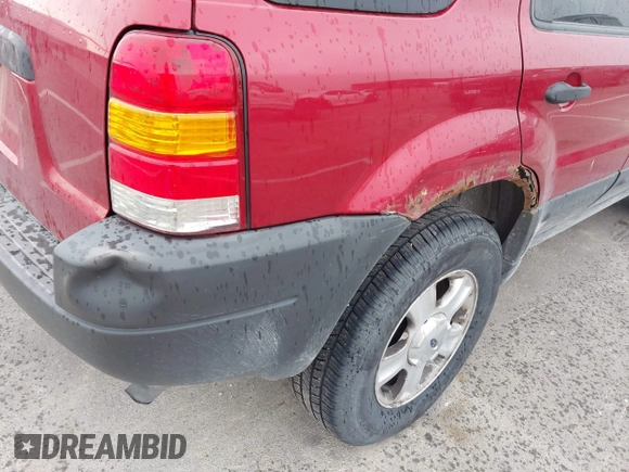 2003 Ford Escape XLT Popular 2 with VIN 1FMYU93103KA03842, listed as a IAAI auction lot 42517607 with 131,733 mi miles and . Bid and sale history available at DreamBid. Image 6.