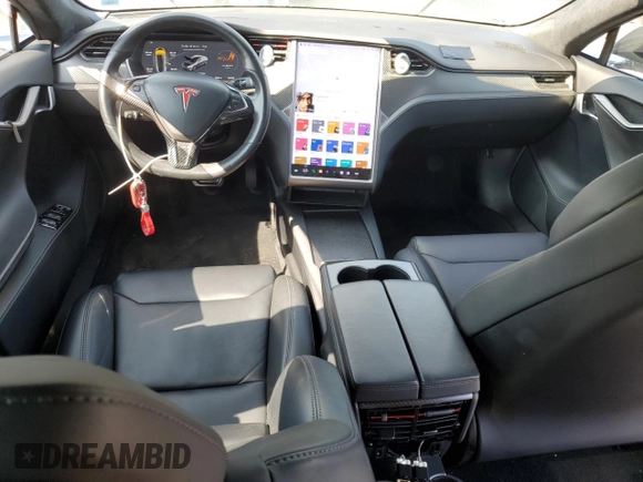 2019 Tesla Model S 100D с VIN 5YJSA1E42KF312803, выставлен на аукционе Copart как лот 71246484 с пробегом 89 820 миль миль и На запчасти • Non repairable. История ставок и продаж доступна на DreamBid. Изображение 8.