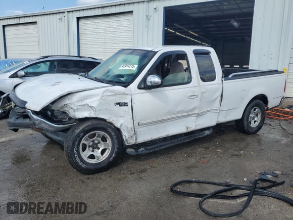2000 Ford F-150 XL with VIN 1FTZX1727YNB23518, listed as a Copart auction lot 43914215 with 0 mi miles and Salvage Title. Bid and sale history available at carsss.com. Image 1.