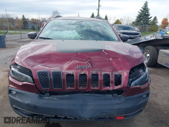 2019 Jeep Cherokee Trailhawk Elite with VIN 1C4PJMBX6KD378848, listed as a IAAI auction lot 40754408 with 52,901 mi miles. Bid and sale history available at carsss.com. Image 6.