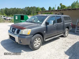 2004 Nissan Titan LE with VIN 1N6AA07B04N546666, listed as a IAAI auction lot 42045671 with 280,796 mi miles. Bid and sale history available at carsss.com. Image 2.