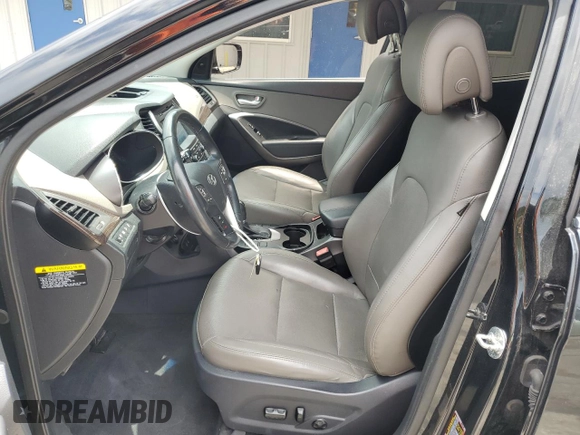 2017 Hyundai Santa Fe 2.4L with VIN 5NMZUDLB8HH048454, listed as a Copart auction lot 64727415 with 82,828 mi miles and Salvage title. Bid and sale history available at DreamBid. Image 7.