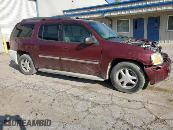 2003 GMC Envoy SLT z VIN 1GKET16S136186780, wystawiony jako Copart lot #55927155 z przebiegiem 163 099 mil mil oraz Szkoda całkowita • Salvage title. Historia ofert i sprzedaży dostępna na DreamBid. Obrazek 4.