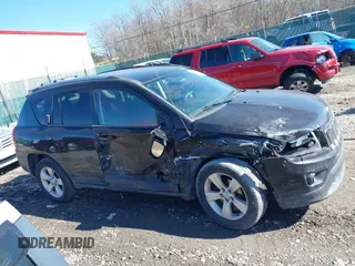 2014 Jeep Compass Sport with VIN 1C4NJDBB0ED567592, listed as a IAAI auction lot 41696070 with 150,303 mi miles. Bid and sale history available at carsss.com. Image 13.