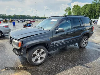 2004 Jeep Grand Cherokee Laredo z VIN 1J4GW48S44C383210, wystawiony jako Copart lot #60422285 z przebiegiem 255 864 mil mil oraz Szkoda całkowita • Salvage title. Historia ofert i sprzedaży dostępna na DreamBid. Obrazek 1.