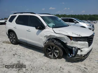 2023 Honda Pilot Touring with VIN 5FNYG2H77PB014212, listed as a Copart auction lot 59222715 with 4,507 mi miles and Salvage title. Bid and sale history available at DreamBid. Image 4.