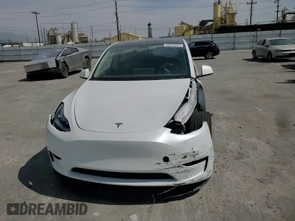 2023 Tesla Model Y Long Range z VIN 7SAYGDEE8PA030286, wystawiony jako Copart lot #50945465 z przebiegiem 43 676 mil mil oraz Szkoda całkowita • Salvage title. Historia ofert i sprzedaży dostępna na DreamBid. Obrazek 12.