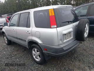 1999 Honda CR-V EX with VIN JHLRD1866XC033865, listed as a IAAI auction lot 41219896 with 142,396 mi miles. Bid and sale history available at carsss.com. Image 3.