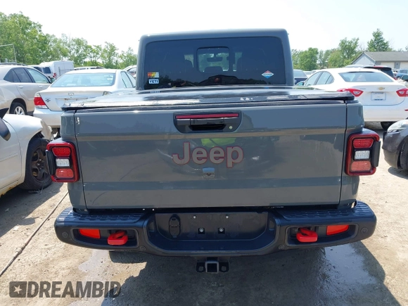 2021 Jeep Gladiator Rubicon with VIN 1C6JJTBG2ML515932, listed as a IAAI auction lot 42471704 with 57,775 mi miles and . Bid and sale history available at DreamBid. Image 17.
