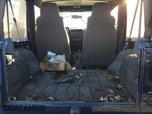2005 Jeep Wrangler SE with VIN 1J4FA29S95P370542, listed as a Copart auction lot 85571924 with 105,465 mi miles and Salvage Title. Bid and sale history available at carsss.com. Image 10.