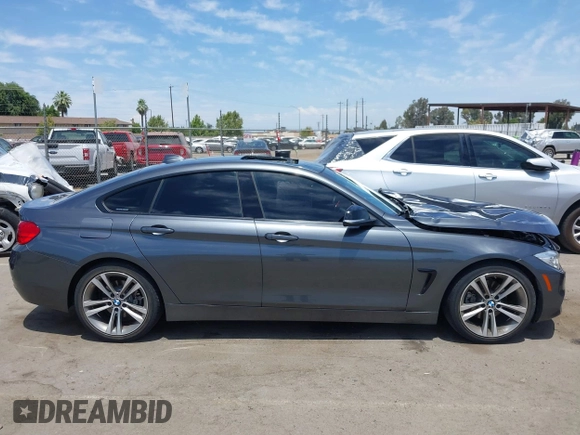 2015 BMW 4 Series 428i with VIN WBA4A5C59FG052596, listed as a IAAI auction lot 42649927 with 68,842 mi miles and . Bid and sale history available at DreamBid. Image 13.