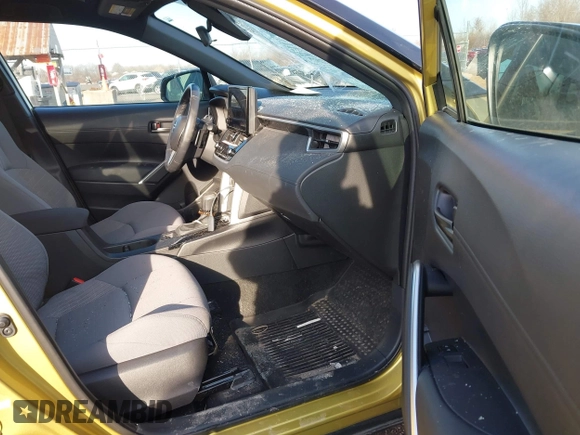 2023 Toyota Corolla Cross Hybrid S with VIN 7MUFBABG0PV016572, listed as a IAAI auction lot 41747214 with 10,935 mi miles and . Bid and sale history available at DreamBid. Image 5.