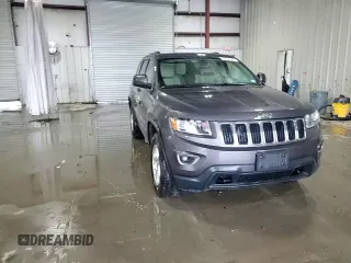 2014 Jeep Grand Cherokee Laredo with VIN 1C4RJFAGXEC333265, listed as a Copart auction lot 55746305 with 119,309 mi miles and Salvage Title. Bid and sale history available at DreamBid. Image 14.