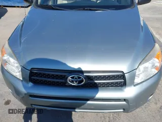 2006 Toyota RAV4 with VIN JTMZD33V465012121, listed as a IAAI auction lot 42013354 with 214,726 mi miles. Bid and sale history available at carsss.com. Image 6.