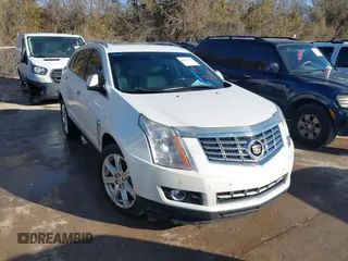 2014 Cadillac SRX Premium Collection z VIN 3GYFNDE3XES533196, wystawiony jako IAAI lot #41671243 z przebiegiem 149 994 mil mil oraz . Historia ofert i sprzedaży dostępna na DreamBid. Obrazek 1.