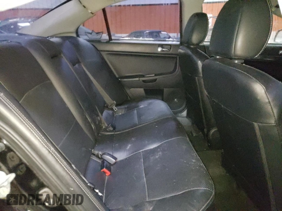 2009 Mitsubishi Lancer GTS z VIN JA3AU86W99U602354, wystawiony jako Copart lot #58919705 z przebiegiem 232 045 mil mil oraz Szkoda całkowita • Salvage title. Historia ofert i sprzedaży dostępna na DreamBid. Obrazek 10.