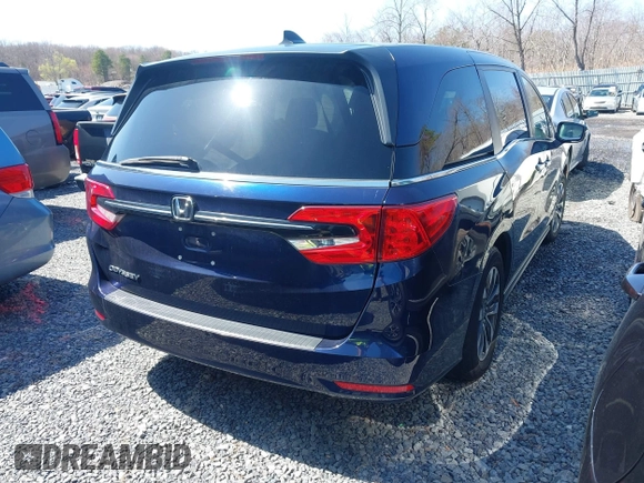 2022 Honda Odyssey EX-L with VIN 5FNRL6H7XNB061061, listed as a IAAI auction lot 41257019 with 52,194 mi miles and . Bid and sale history available at DreamBid. Image 4.