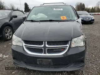 2016 Dodge Grand Caravan SXT with VIN 2C4RDGCG5GR310805, listed as a Copart auction lot 49683255 with 93,703 mi miles and Salvage Title. Bid and sale history available at carsss.com. Image 5.
