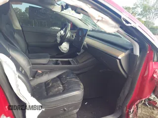 2021 Tesla Model Y Long Range z VIN 5YJYGAEE3MF184396, wystawiony jako IAAI lot #42321116 z przebiegiem Nie podano mil oraz . Historia ofert i sprzedaży dostępna na DreamBid. Obrazek 5.