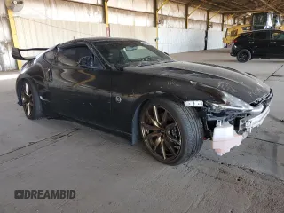 2009 Nissan 370Z z VIN JN1AZ44E19M411715, wystawiony jako Copart lot #56654815 z przebiegiem 123 791 mil mil oraz Szkoda całkowita • Salvage title. Historia ofert i sprzedaży dostępna na DreamBid. Obrazek 4.