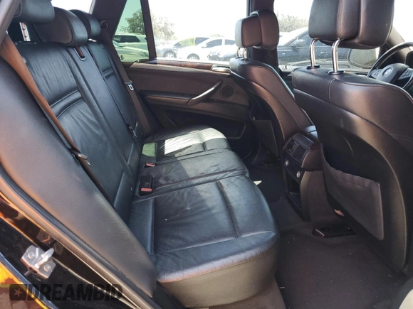 2011 BMW X5 35d with VIN 5UXZW0C58BL662048, listed as a Copart auction lot 55648975 with 166,291 mi miles and Salvage title. Bid and sale history available at DreamBid. Image 11.