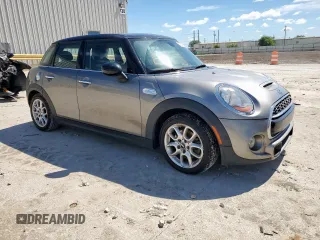 2018 MINI Hardtop 4 Door Cooper S with VIN WMWXU3C50J2F50669, listed as a Copart auction lot 55924355 with 64,702 mi miles and Salvage title. Bid and sale history available at DreamBid. Image 4.