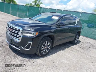 2023 GMC Acadia SLT with VIN 1GKKNMLS5PZ251525, listed as a IAAI auction lot 42266684 with 30,544 mi miles and . Bid and sale history available at DreamBid. Image 2.